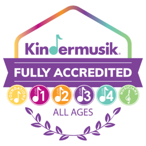 A Kindermusik accreditation badge, stating "Kindermusik - FULLY ACCREDITED - ALL AGES"